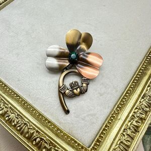 Western antique jewelry. Scottish Celtic style motif three leaf clada grass pin